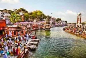 Comprehensive 13-day Golden Triangle holiday tour package itinerary featuring Haridwar Ganga Aarti rituals, the Agra Taj Mahal, Ranthambore tiger safaris, and Udaipur romantic lake palaces by Aamantran Tours.