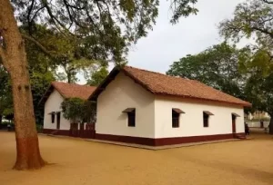 The peaceful and historic Sabarmati Ashram, an iconic cultural landmark featured on day one of our 2-day Ahmedabad weekend tour package.