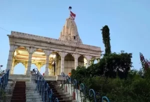 The beautiful Takhteshwar Temple situated on a hill, offering panoramic views of the city, featured on day one of our 2-day Bhavnagar tour package.
