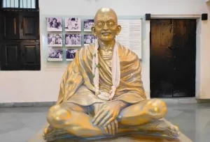 A statue of Mahatma Gandhi, honoring his legacy and early life in the city, featured on our 2-day Rajkot historical tour package.