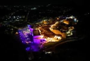 The beautifully illuminated Smritivan Earthquake Memorial at night, a stunning architectural and historical highlight of our 3-day Bhuj tour package.