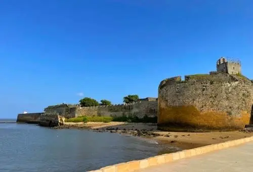The historic coastal architecture of Diu Fort, a magnificent Portuguese heritage highlight featured in our customized Gujarat tour packages starting from Diu.