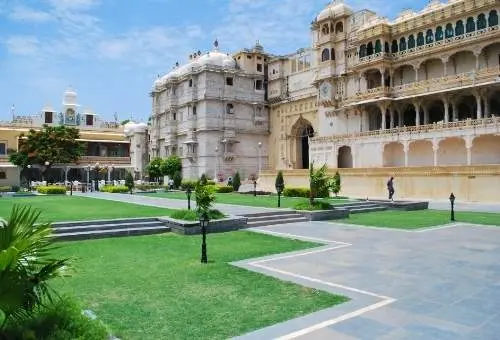 A stunning view from the courtyard of the City Palace in Udaipur, a majestic starting point for customized Rajasthan heritage and package tours.