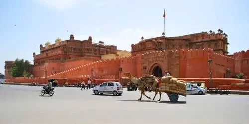 The magnificent red sandstone and marble architecture of Junagarh Fort in Bikaner, uniquely built on the flat desert plains rather than a hilltop.